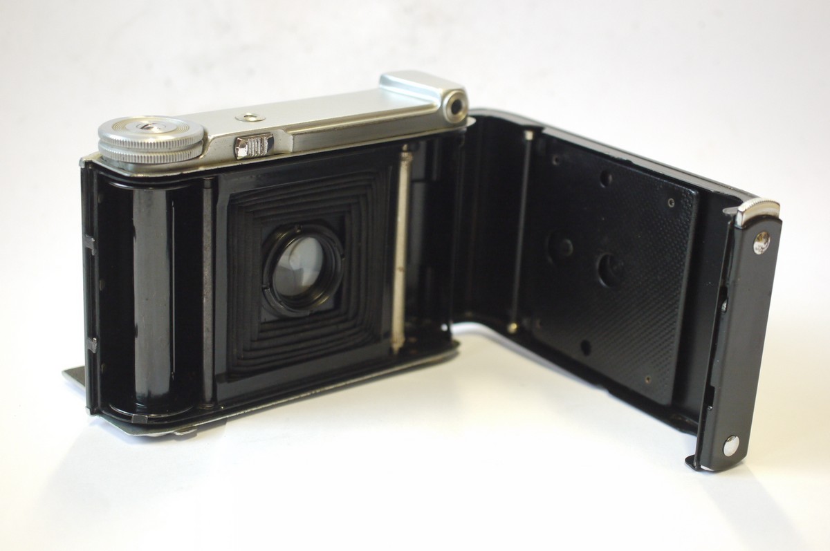 mwclassiccameras-20240906-24 Voigtlander Bessa 66 folding camera with 75mm f3.5 Heliar lens in Compur shutter, with hinging Yellow moment filter