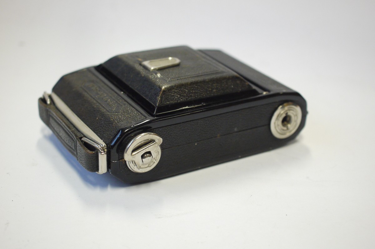 mwclassiccameras-20240906-249 Zeiss Ikon Super Ikonta 530 6x4.5 folding coupled rangefinder camera with nickel fittings & 7cm f3.5 Tessar lens in Compur shutter. NEEDS RESTORATION