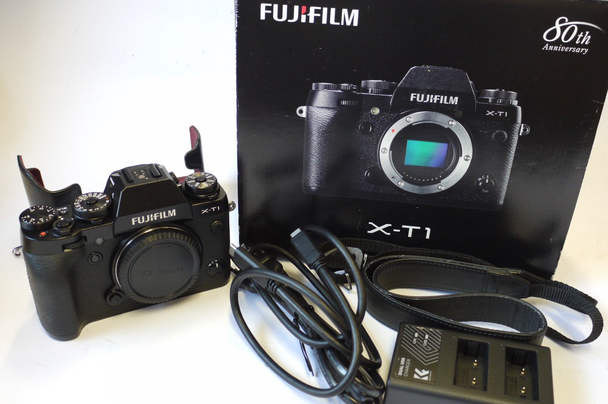 mwclassiccameras-20240920-47 Fujifilm X-T1 Digitl Mirrorless body, with Battery, Charger, Case base, Neck Strap, Dual USB Charger, CD ROM, Instructions & Original box with packaging