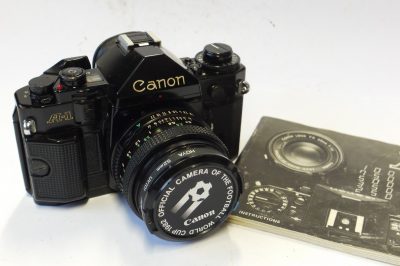 Canon A-1 35mm SLR (with Program, Semi-Auto & Manual Exposure modes) + 50mm f1.8 FD lens & Original Instructions