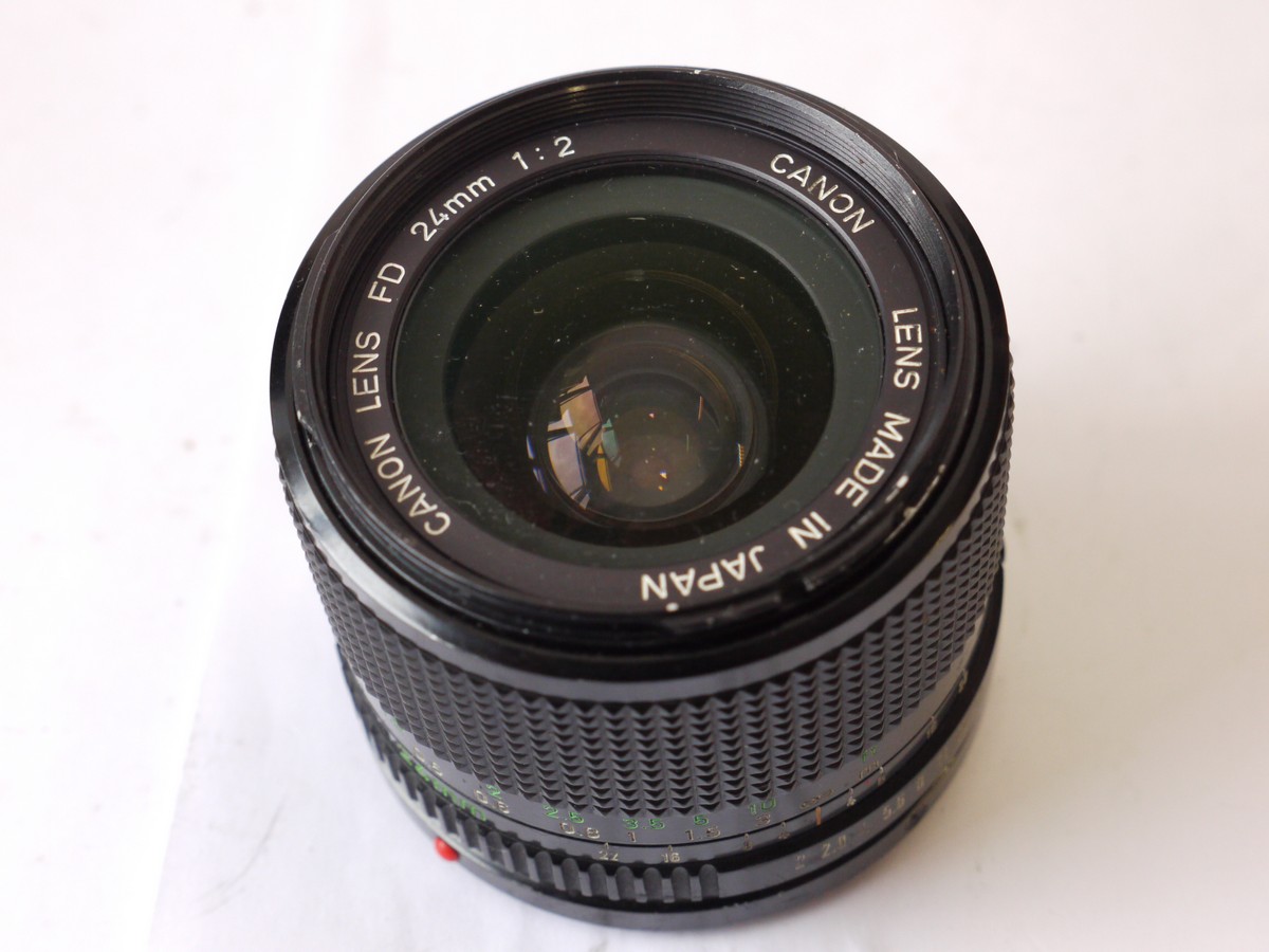 mwclassiccameras-20240927-329 Canon 24mm f2 Manual Focus Fast Wide-Angle lens, FD mount + BW-52C bayonet lens hood