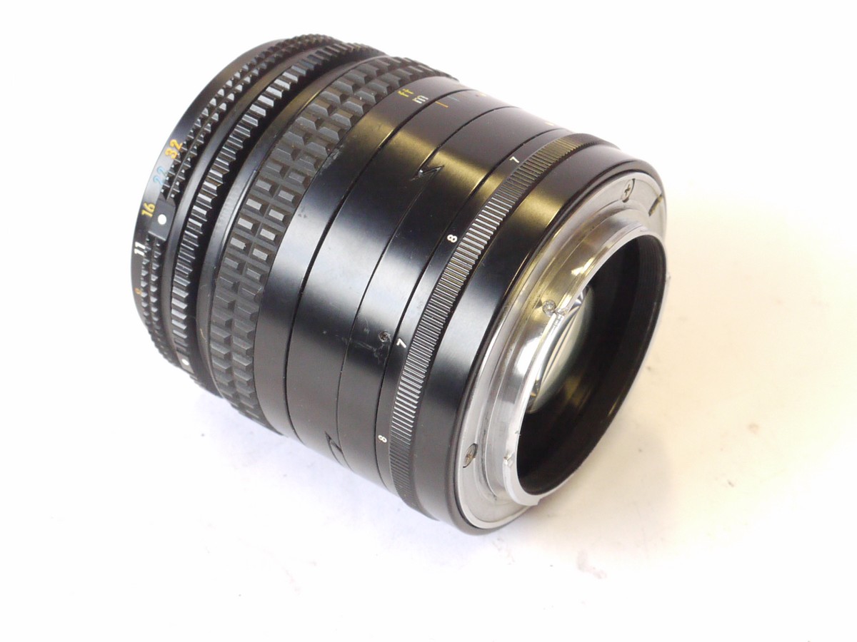 mwclassiccameras-20240927-430 Nikon 35mm f2.8 PC-Nikkor Shift Lens, Nikon F mount + Nikon caps