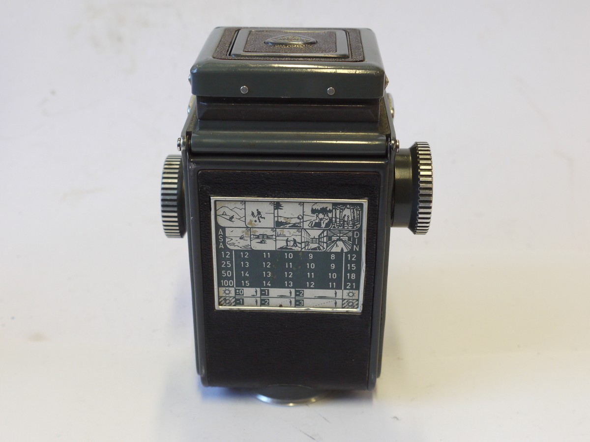 mwclassiccameras-20241004-121 Rolleiflex Baby Grey 4x4 TLR, Grey, recovered with black letherette covering, with Schneider 60mm f3.8 Xenar lens in Synchro Compur shutter