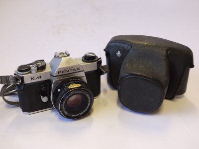Pentax KM 35mm SLR, chrome + 50mm f1.7 SMC Pentax-M PKM mount lens, neck strap & ER case