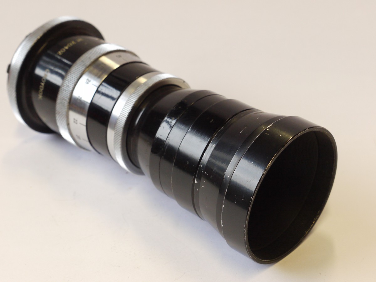 mwclassiccameras-20241011-106 Agilux 24cm f5.5 Telephoto bayonet mount lens for Agiflex SLR + makers black metal lens hood & leather case