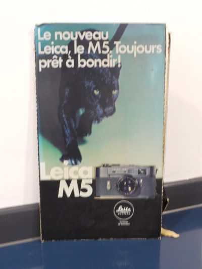 Le Nouveau Leica, Le M5, Toujour Pret A Bondir. Vintage 1970's Card Display sign with cut-out Leica M5, with rear card support panel