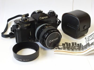 Canon EF 35mm SLR, black + 50mm f1.4 S.S.C. FD Breechlock mount lens, BW-55A lens hood )cased), Canon front cap & Canon Neck Strap