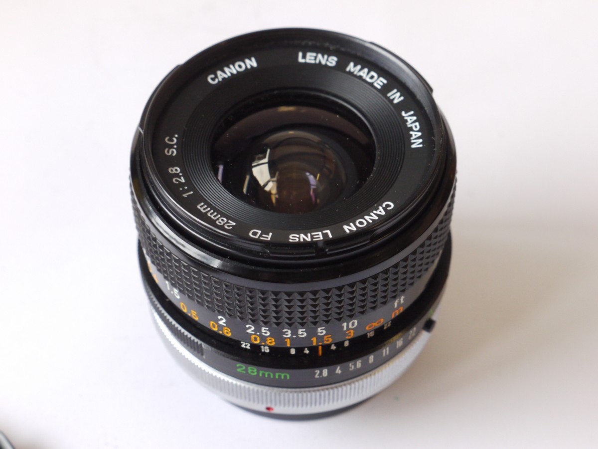 mwclassiccameras-20241018-85 Canon 28mm f2.8 S.C. manual focus FD Breechlock mount lens + Canon Caps & case