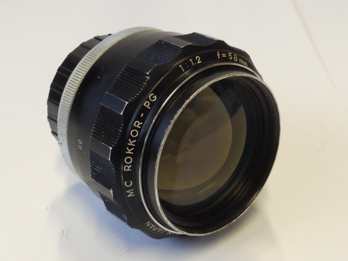 mwclassiccameras-20241025-123 Minolta 58mm f1.2 MC Rokkor-PG manual focus MC mount lens + caps