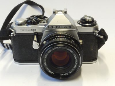 Pentax ME Super chrome + 50mm f1.7 SMC Pentax-M PKM mount lens, Pentax front cap & neck strap