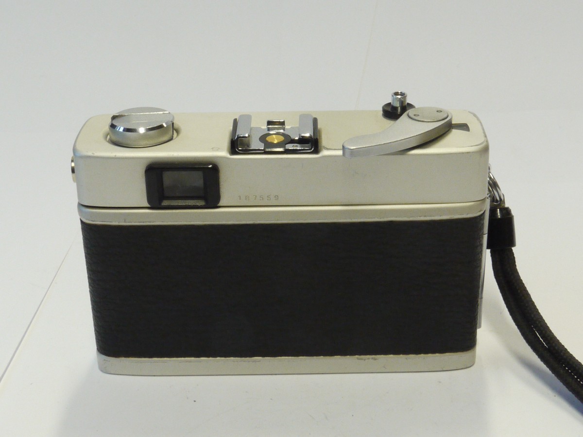 mwclassiccameras-20241025-239 Konica C35 35mm CDS metered Auto Exposure coupled rangefinder camera, chrome, with 38mm f2.8 Hexanon lens + Wrist Strap & Instructions. NON-WORKING