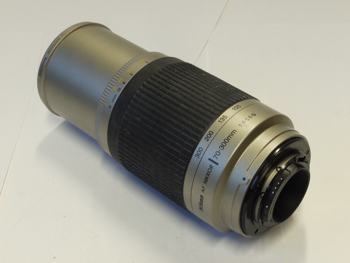 mwclassiccameras-20241025-268 Nikon 70-300mm f4-5.6G AF Nikkor Silver Grey coloured lens + bayonet lens hood