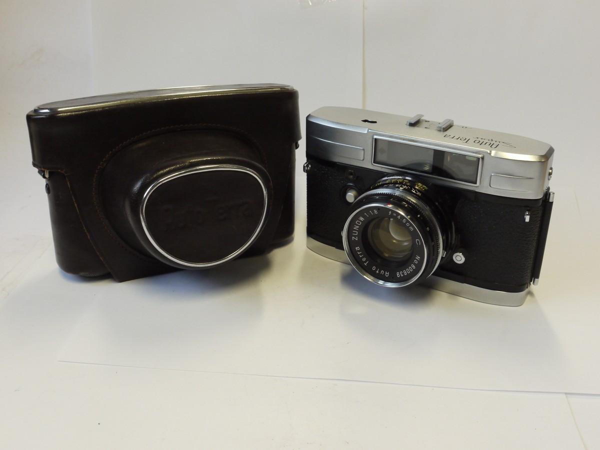 mwclassiccameras-20241108-89 Teraoka Auto Terra Super 35mm coupled rangefinder Spring Motorised camera c1959 with 4.5cm f1.8 ZUNOW lens + Auto Tera ER case. RARE COLLECTABLE CAMERA & CONDITION