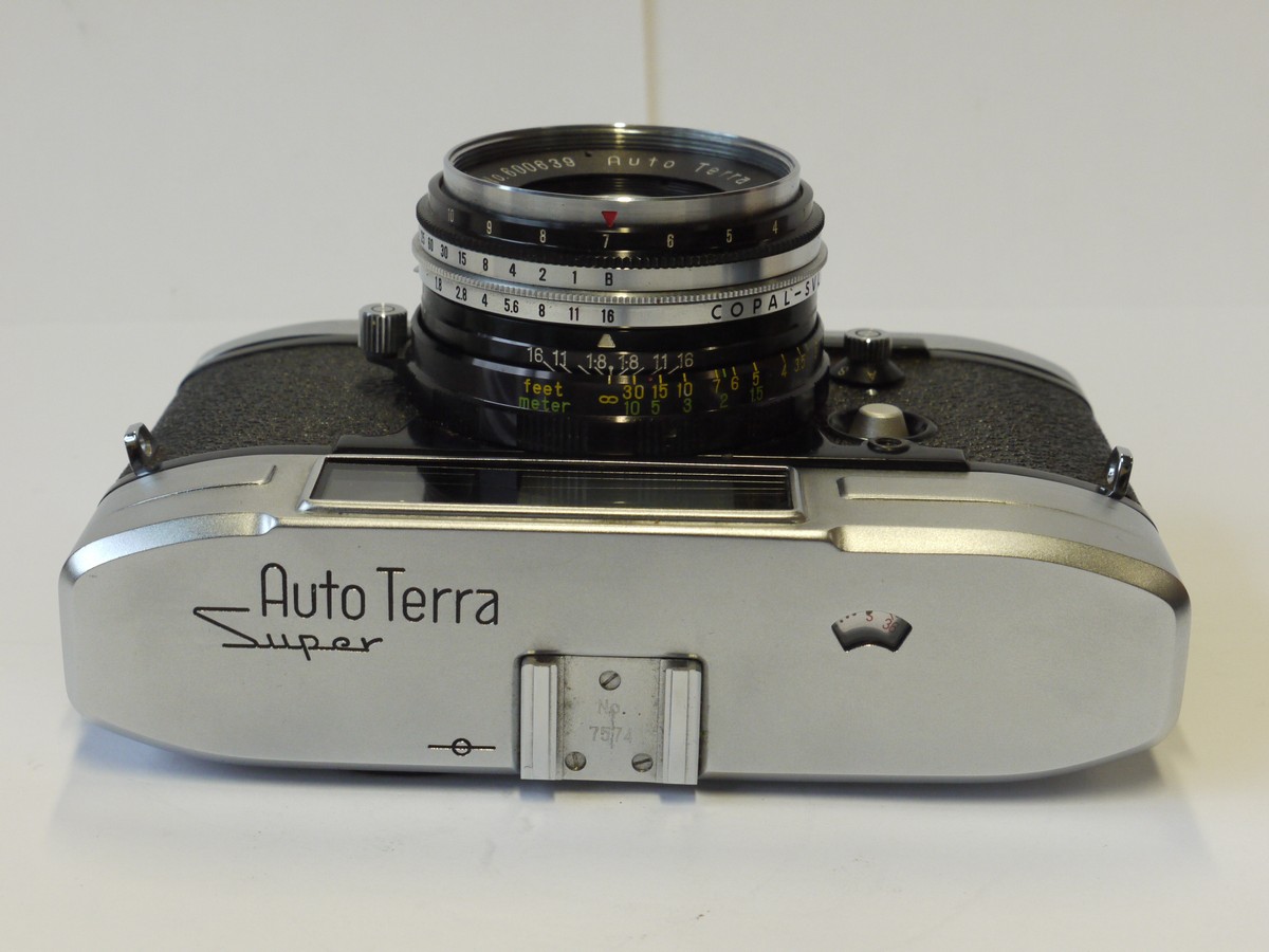 mwclassiccameras-20241108-93 Teraoka Auto Terra Super 35mm coupled rangefinder Spring Motorised camera c1959 with 4.5cm f1.8 ZUNOW lens + Auto Tera ER case. RARE COLLECTABLE CAMERA & CONDITION