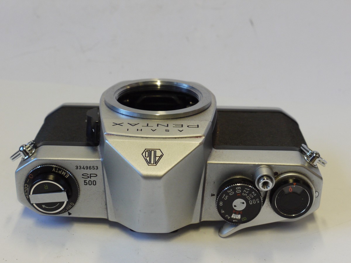 mwclassiccameras-20241129-39 Pentax SP500 35mm SLR, chrome body, with Pentax ER case with strap