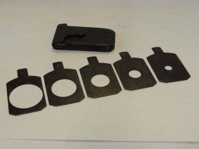 Unamed Waterhouse Stops set of Five Metal Stops, marked 2, 4, 8, 32 & 64 (38x32mm), with end handle grip & Brown leather case