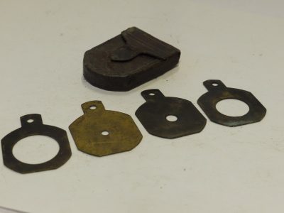 Unamed Waterhouse Stops set of Four Metal Stops with Aperture/Diameter markings. (28x19mm), with end handle grip with end hole & Green leather case