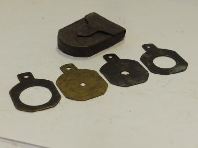 Unamed Waterhouse Stops set of Four Metal Stops with Aperture/Diameter markings. (28x19mm), with end handle grip with end hole & Green leather case