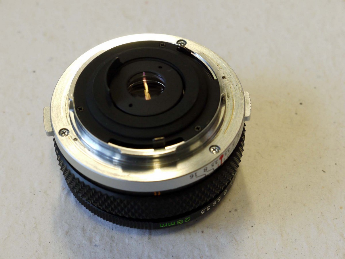 mwclassiccameras-20241206-118 Olympus 28mm f3.5 G Zuiko Auto-W manual focus OM mouont lens + Olympus caps