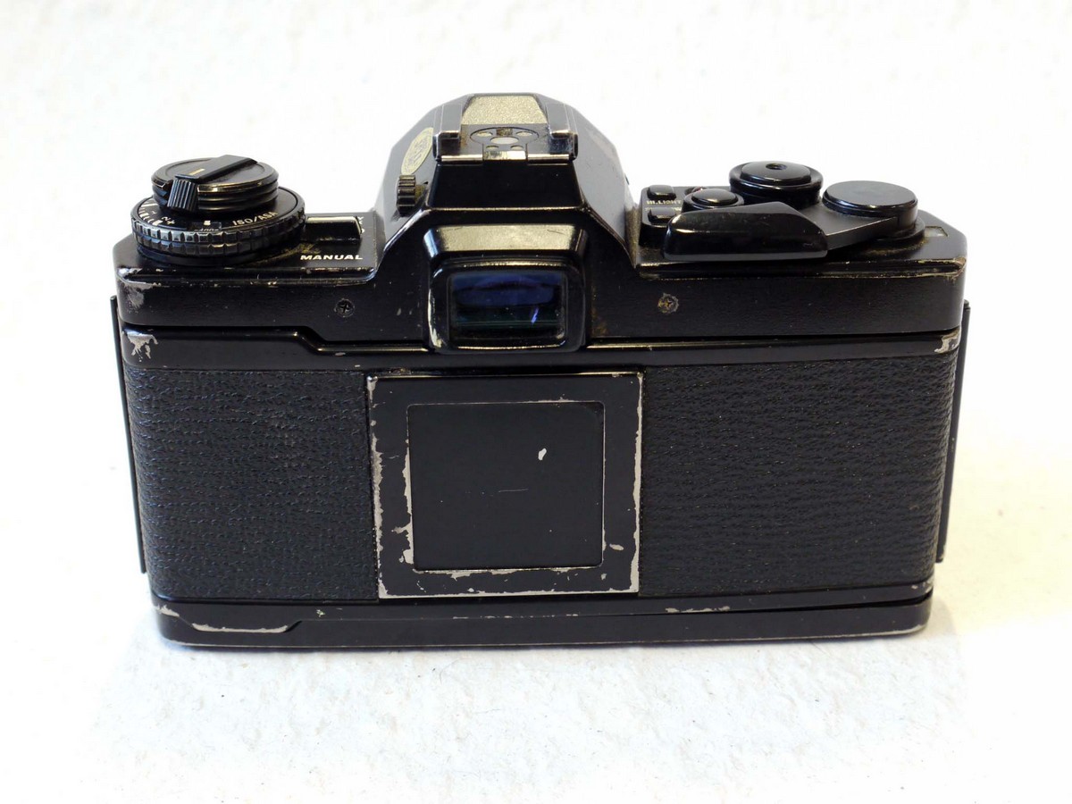 Olympus OM-4 Ti 35mm SLR body, black + ER case – MW Classic Cameras