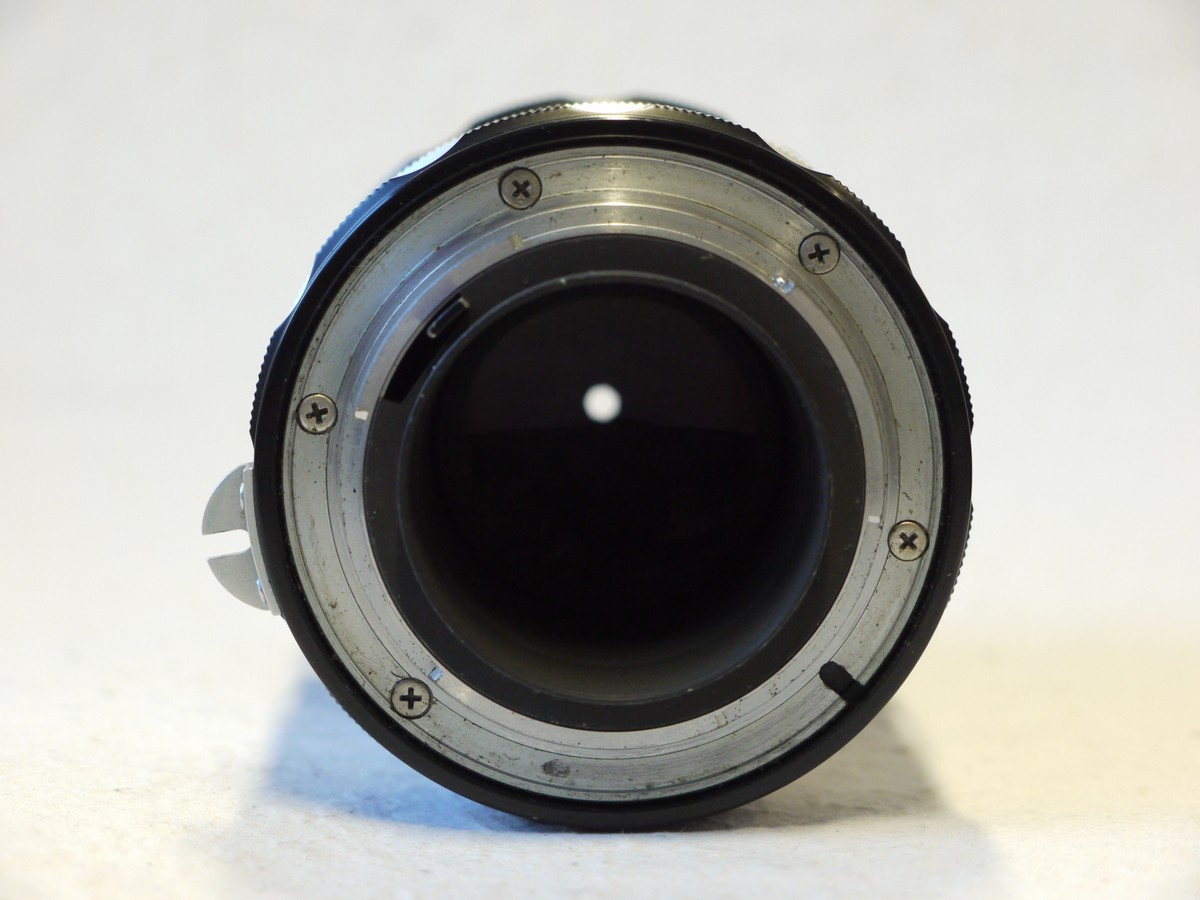mwclassiccameras-20241219-66 Nikon 135mm f3.5 Nikkor-Q.C black & chrome PRE-AI mount lens + HS-4 metal lens hood & rear cap