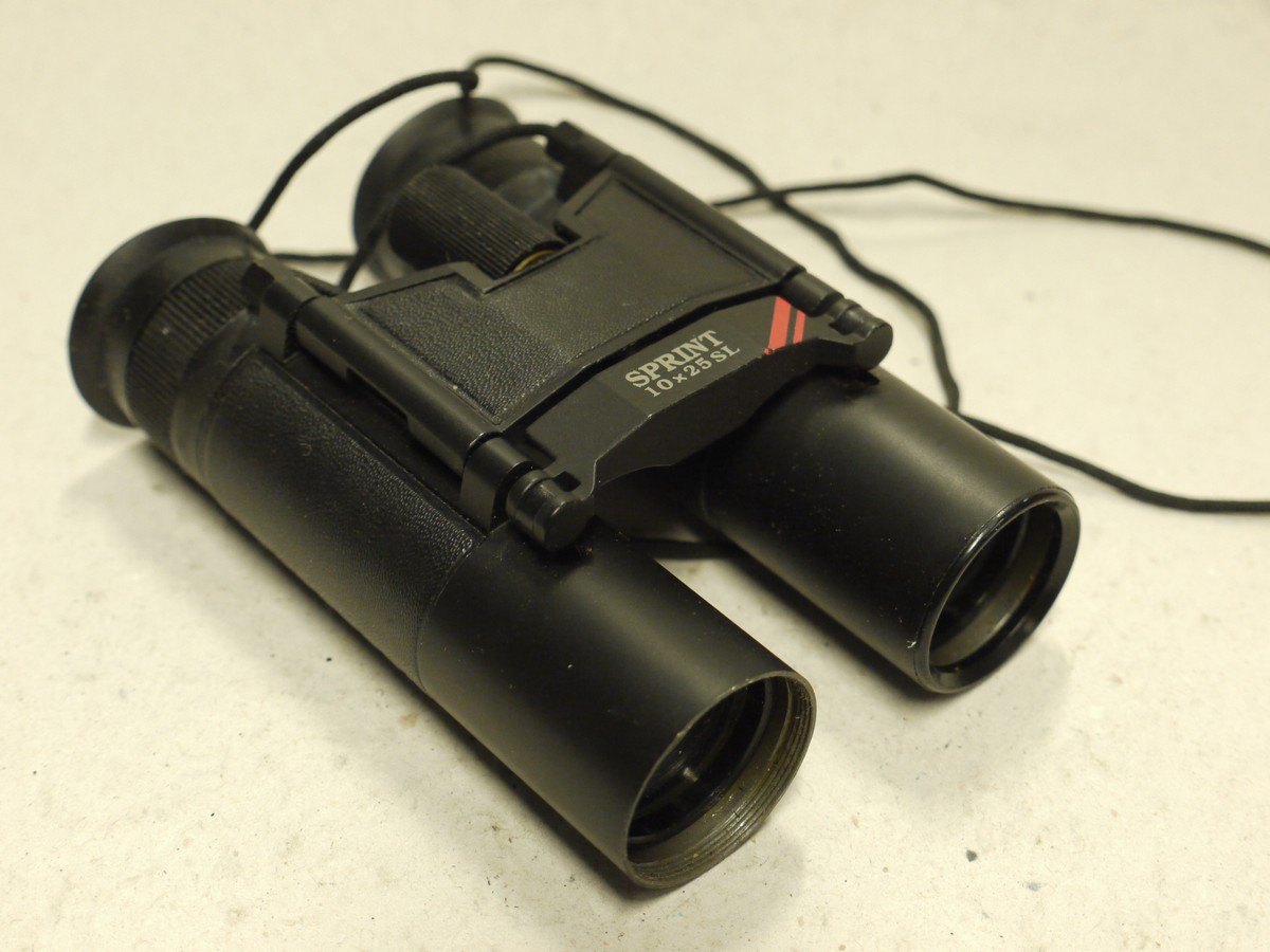 mwclassiccameras-20250103-200 Bresser Sprint 10x25 SL Folding Roof Prism Pocket binoculars with strap. 96m/1000m