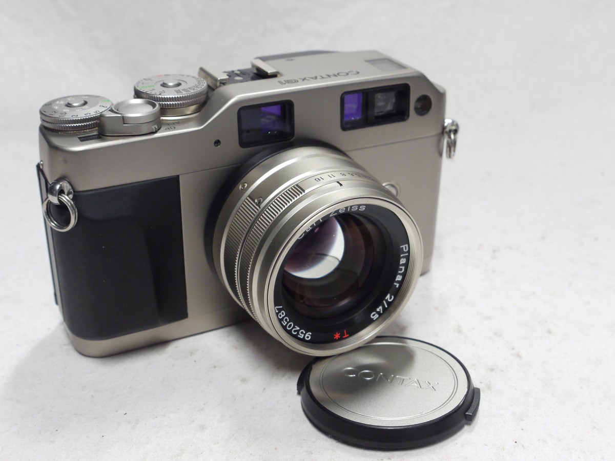 mwclassiccameras-20250110-238 Contax G1 35mm Autofocus, Motorised camera, Grey finish + 45mm f2 Planar T* interchangeable lens, with Contax front cap