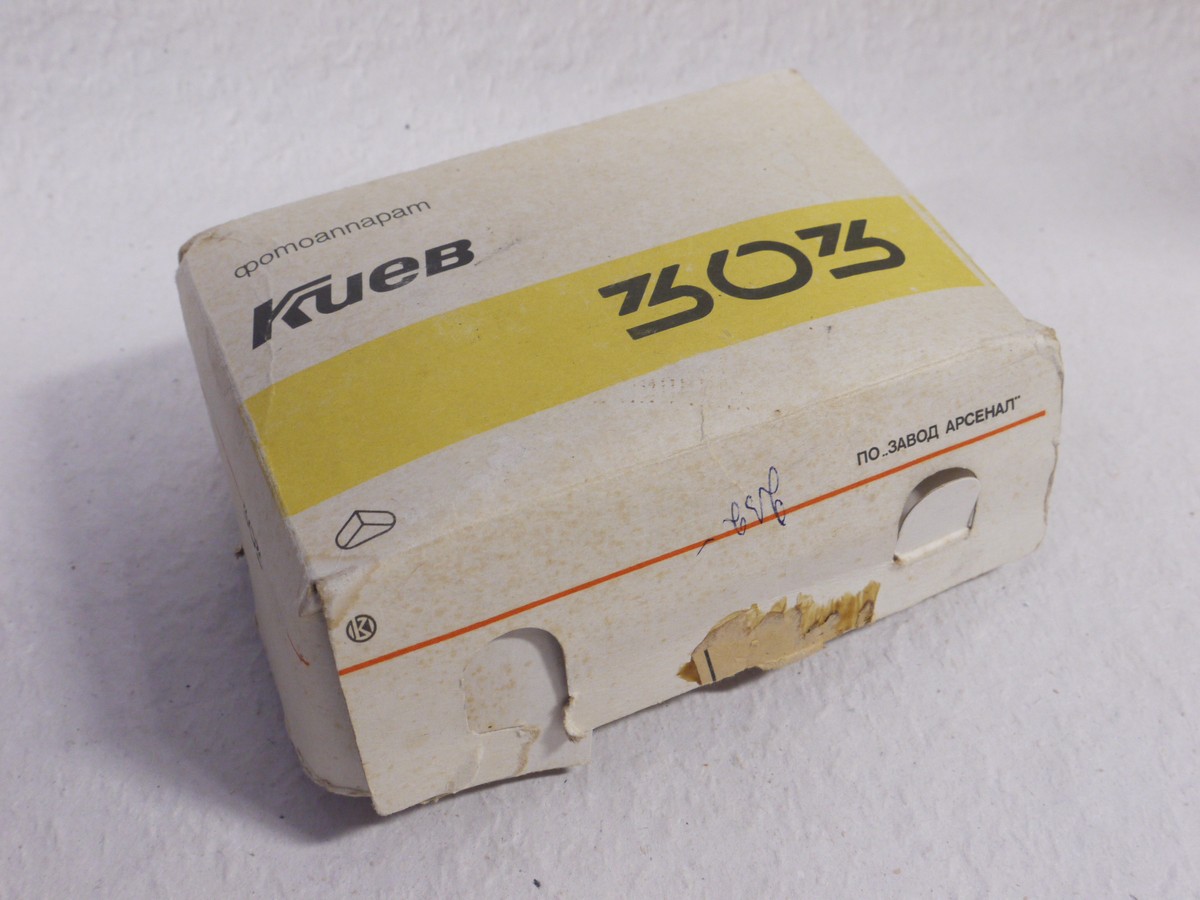 mwclassiccameras-20250117-13 Kiev 303 black 16mm Subminiature camera with case, strap, film with container, unused film, Developing tank/spool, instructions in Cyrillic & outfit Box