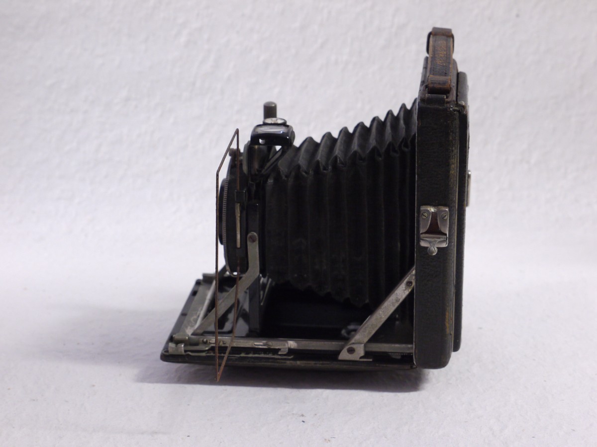 mwclassiccameras-20250117-21 KW Etui 6x9 folding camera with 10.5cm f4.5 Tessar lens in Compur shutter + Set of Seven Film backs & Sands & Hunter outfit case