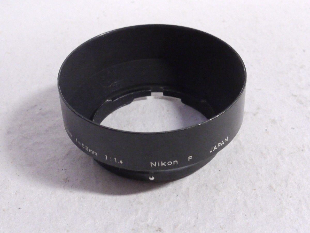 mwclassiccameras-20250117-37 Nikon F Clip-on metal lens hood for 50mm & 58mm f1.4 SLR Lens