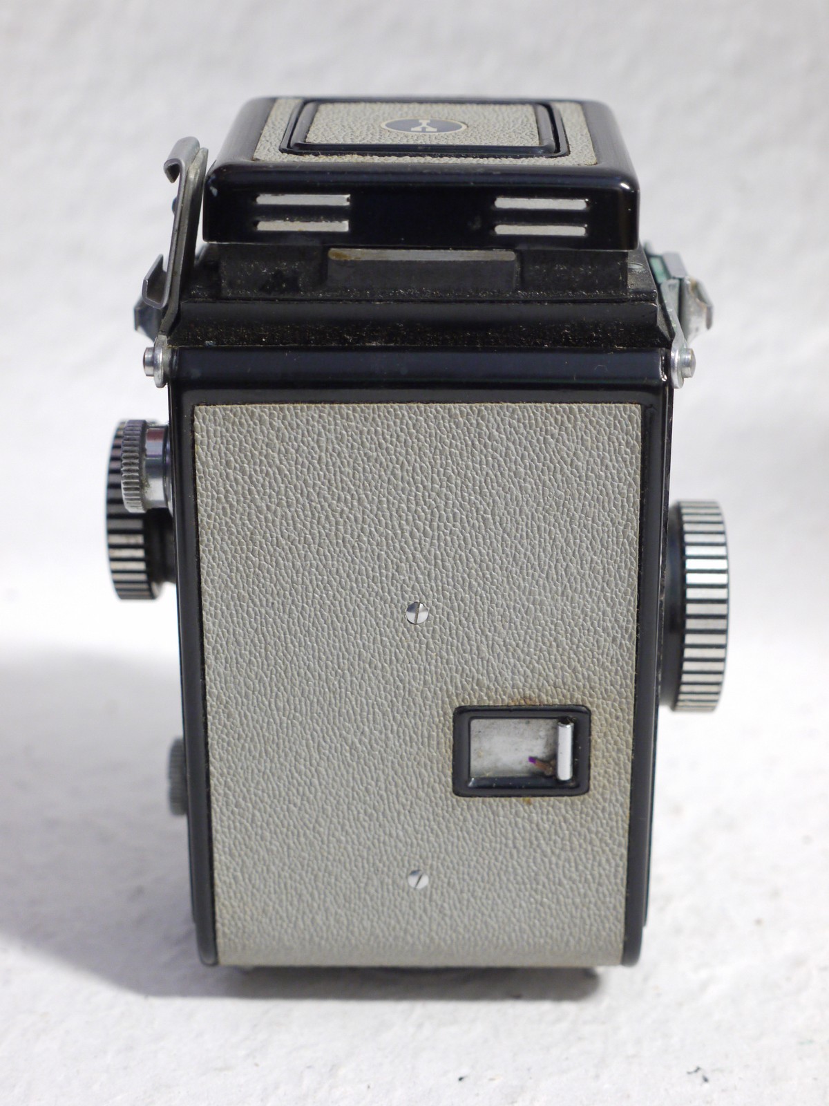 mwclassiccameras-20250124-129 Yashica-44 127 TLR, 4x4, Dark Grey body with light grey covering, with 60mm f3.5 Yashikor lens in Copal shutter + Chrome push-on lens hood in Grey Yashica case & Grey leather Camera ER case with strap
