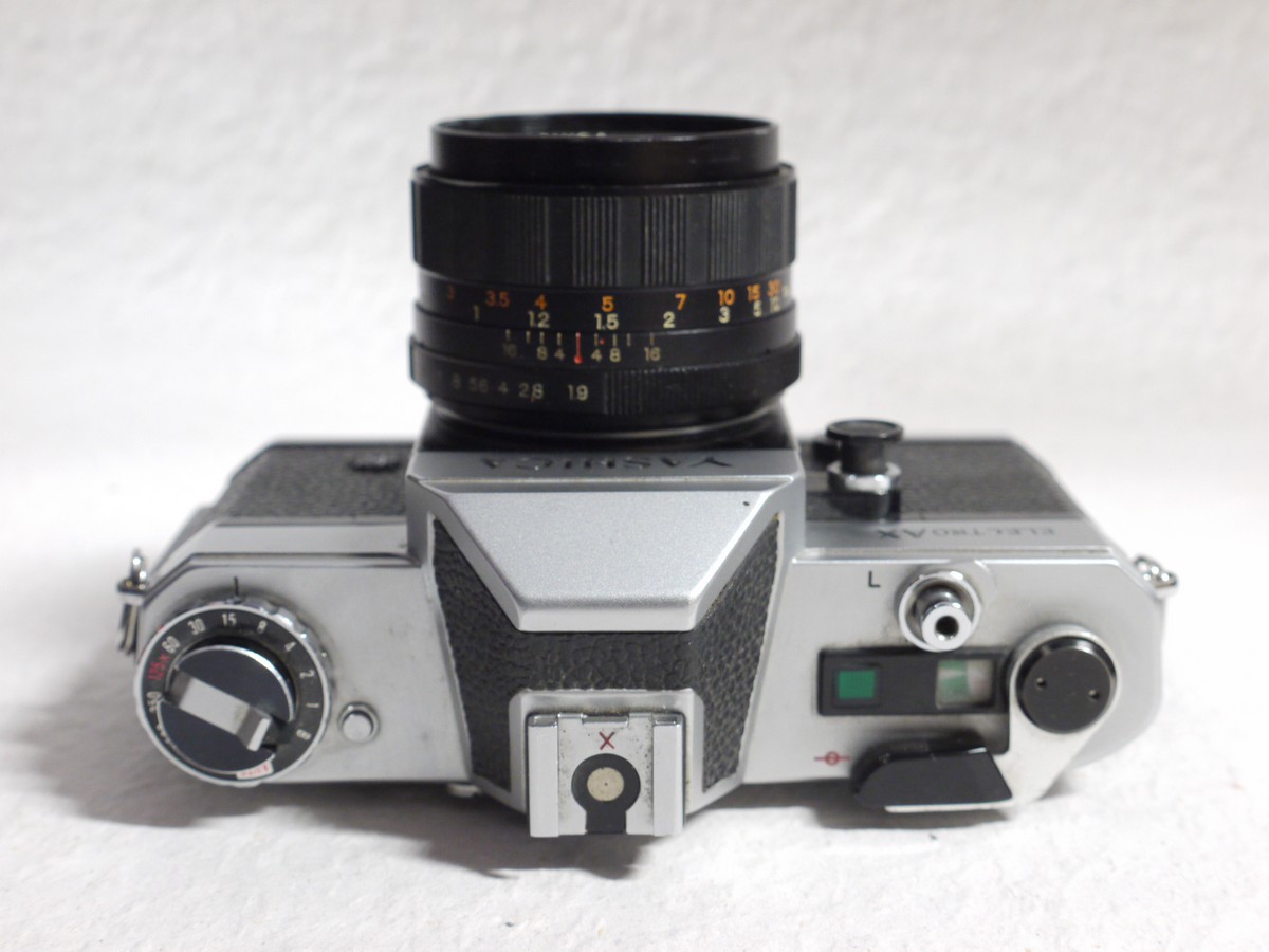 mwclassiccameras-20250124-25 Yashica Electro AX 35mm SLR, chrome + 50mm f1.9 Auto Yashinon M42 screw mount lens, with front cap. UNCOMMON