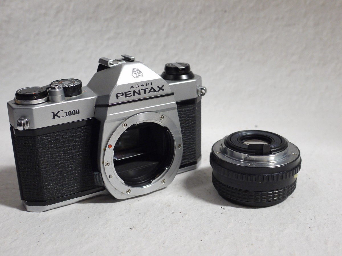mwclassiccameras-20250124-287 Pentax K1000 35mm SLR body, chrome + 50mm f2 SMC Pentax-M lens, Instructions + Pentax Box