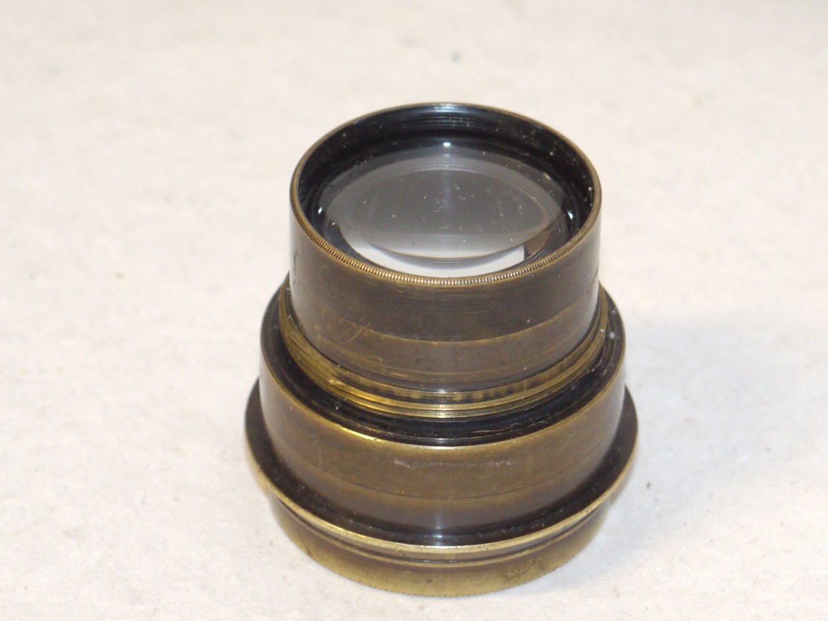 mwclassiccameras-20250131-81 Taylor Hobson 5 3/4 inch f4.5 T-P Cooke Anastigmat brass lens with gold lettering, with Iris Diaphragm & makers front cap