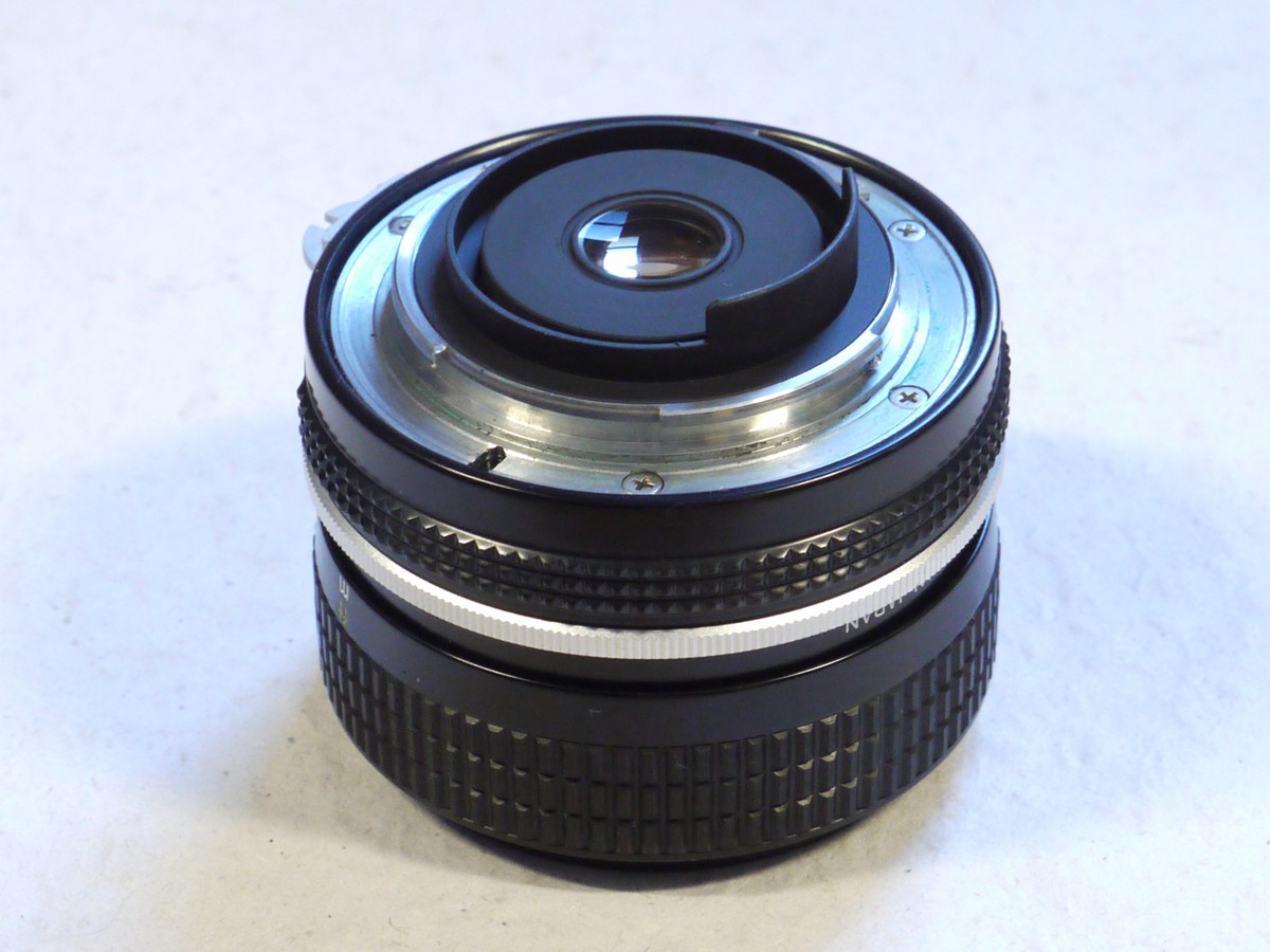 mwclassiccameras-20250207-40 Nikon 28mm f3.5 Nikkor manual focus PRE-AI lens, all black, later type + rear cap & case