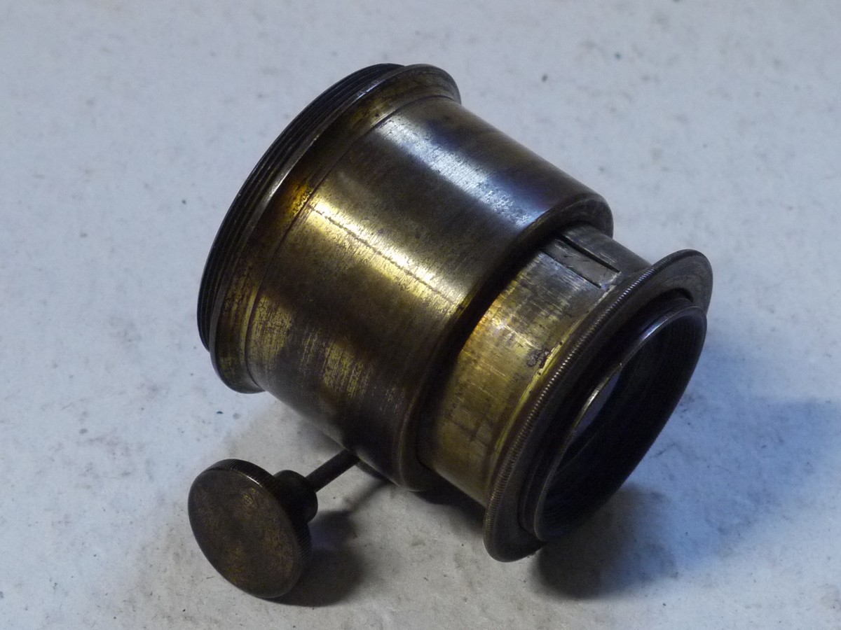 mwclassiccameras-20250214-152 Unamed 4-5 inch Brass lens with Rack & Pinion focusing & flange. Front outer brass tube is missing but lens optics are complete