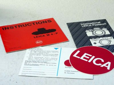 Leitz Original Instructions for the Leica M4-P c1984, with Leitz Passport (unmarked), Postcard & Leica Red Circular Sticker
