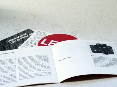 Leitz Original Instructions for the Leica M4-P c1984, with Leitz Passport (unmarked), Postcard & Leica Red Circular Sticker