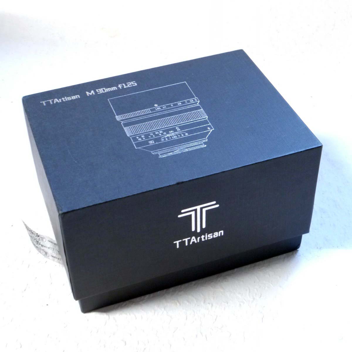 mwclassiccameras-20250221-48 TTArtisan 90mm f1.25 DJ Optical TITANIUM Portrait lens, Leica M mount, with lens hood, caps, Screw Driver, Instructions, Warranty card & Box. RARE TITASNIUM VERSION, NOT RELEASED TO THE PUBLIC, SUPPLIED TO DEALERS ONLY