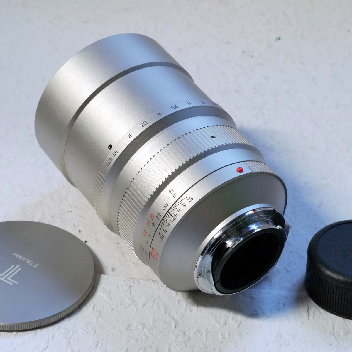 mwclassiccameras-20250221-51 TTArtisan 90mm f1.25 DJ Optical TITANIUM Portrait lens, Leica M mount, with lens hood, caps, Screw Driver, Instructions, Warranty card & Box. RARE TITASNIUM VERSION, NOT RELEASED TO THE PUBLIC, SUPPLIED TO DEALERS ONLY