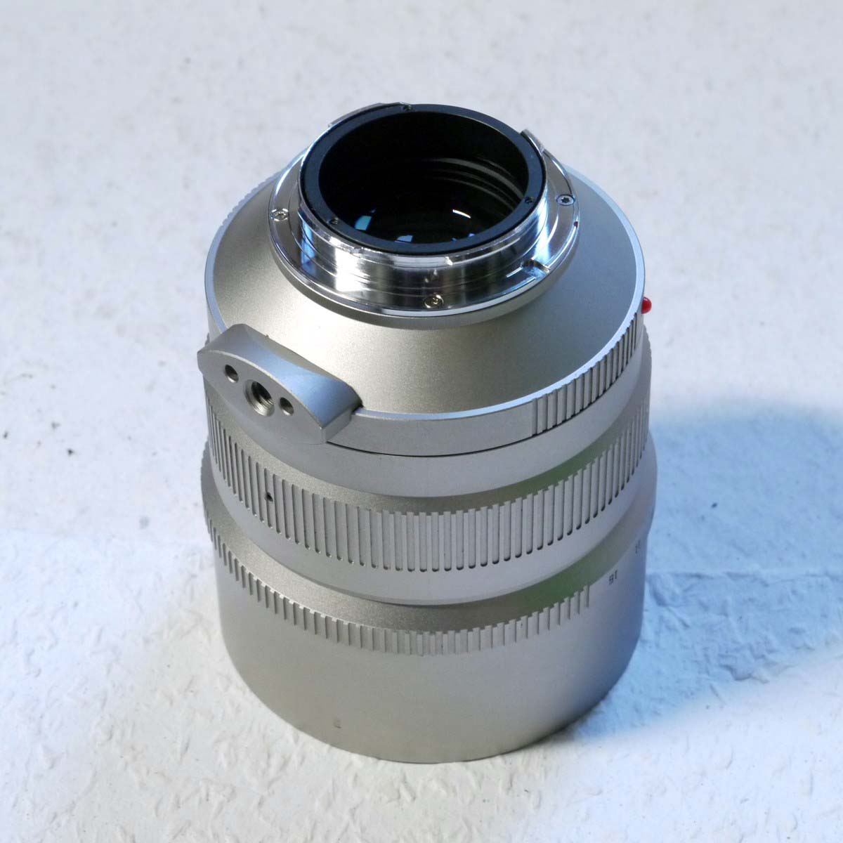mwclassiccameras-20250221-53 TTArtisan 90mm f1.25 DJ Optical TITANIUM Portrait lens, Leica M mount, with lens hood, caps, Screw Driver, Instructions, Warranty card & Box. RARE TITASNIUM VERSION, NOT RELEASED TO THE PUBLIC, SUPPLIED TO DEALERS ONLY