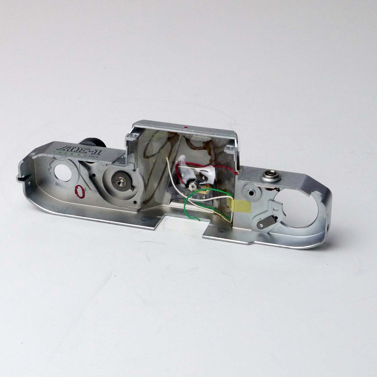mwclassiccameras-20250307-77 Canon AE-1 Program Top Plate spare part, chrome, with shutter dial. With internal wiring/contacts