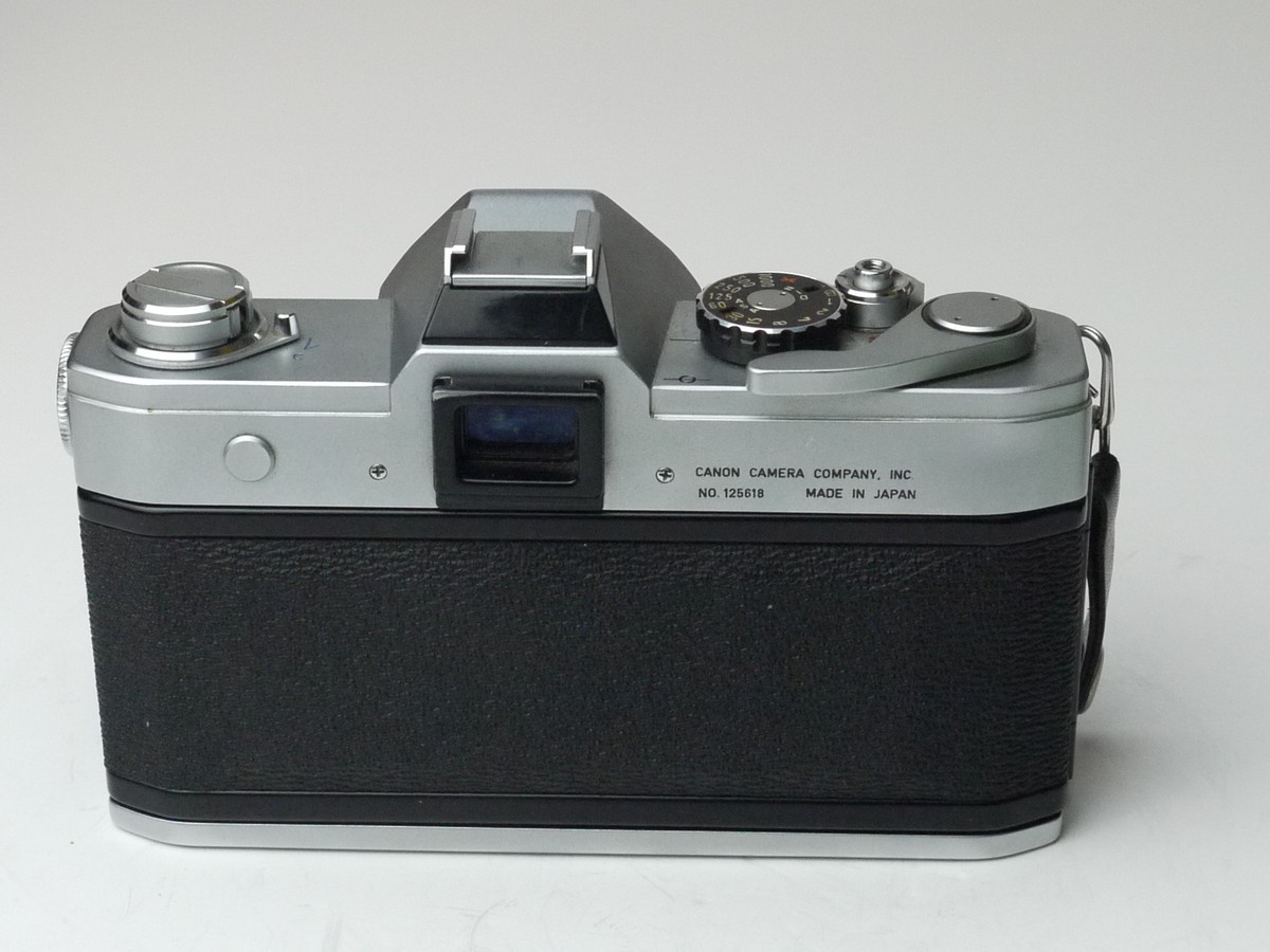mwclassiccameras-20250314-163 Canon FT QL 35mm SLR, chrome + Canon 50mm f1.8 FL Breechlock mount lens with B+W 48mm Clear filter, chrome rim