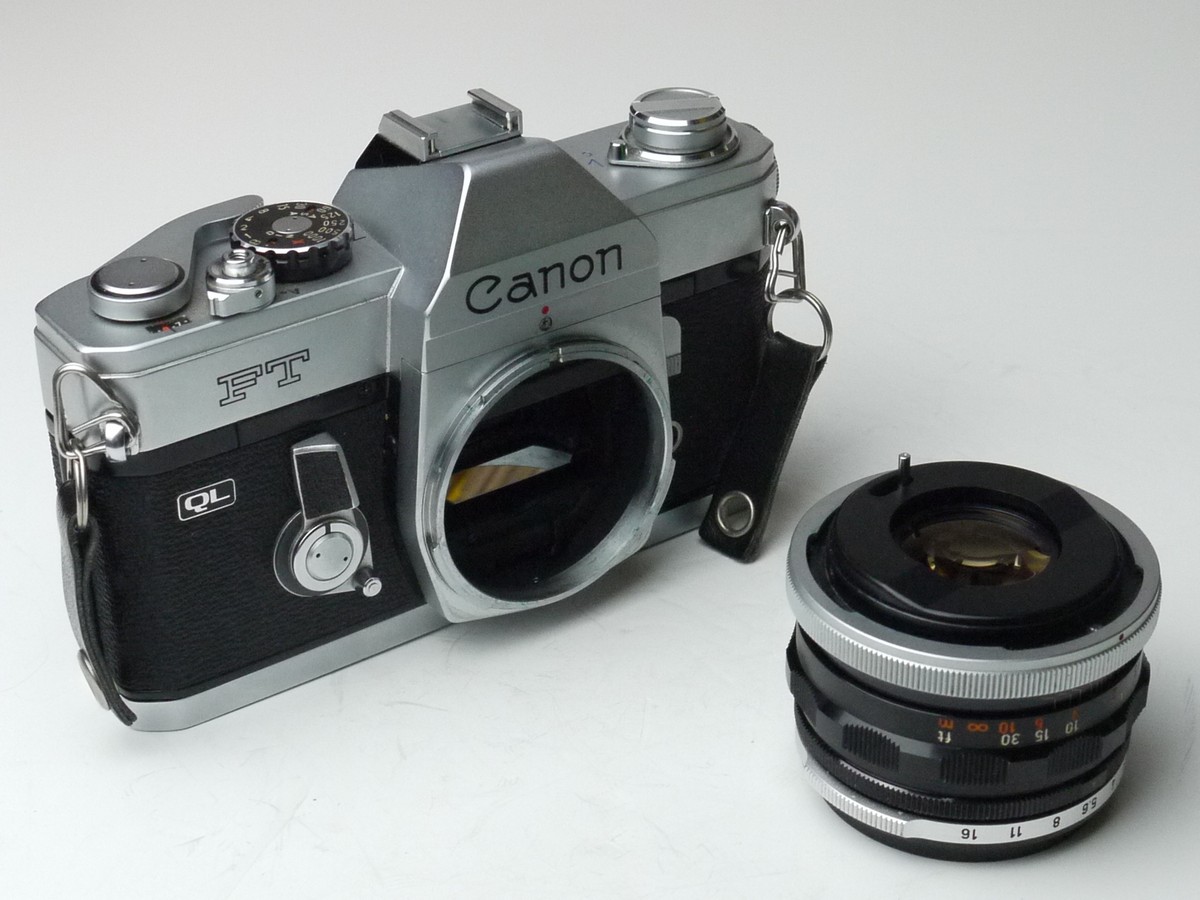 mwclassiccameras-20250314-165 Canon FT QL 35mm SLR, chrome + Canon 50mm f1.8 FL Breechlock mount lens with B+W 48mm Clear filter, chrome rim