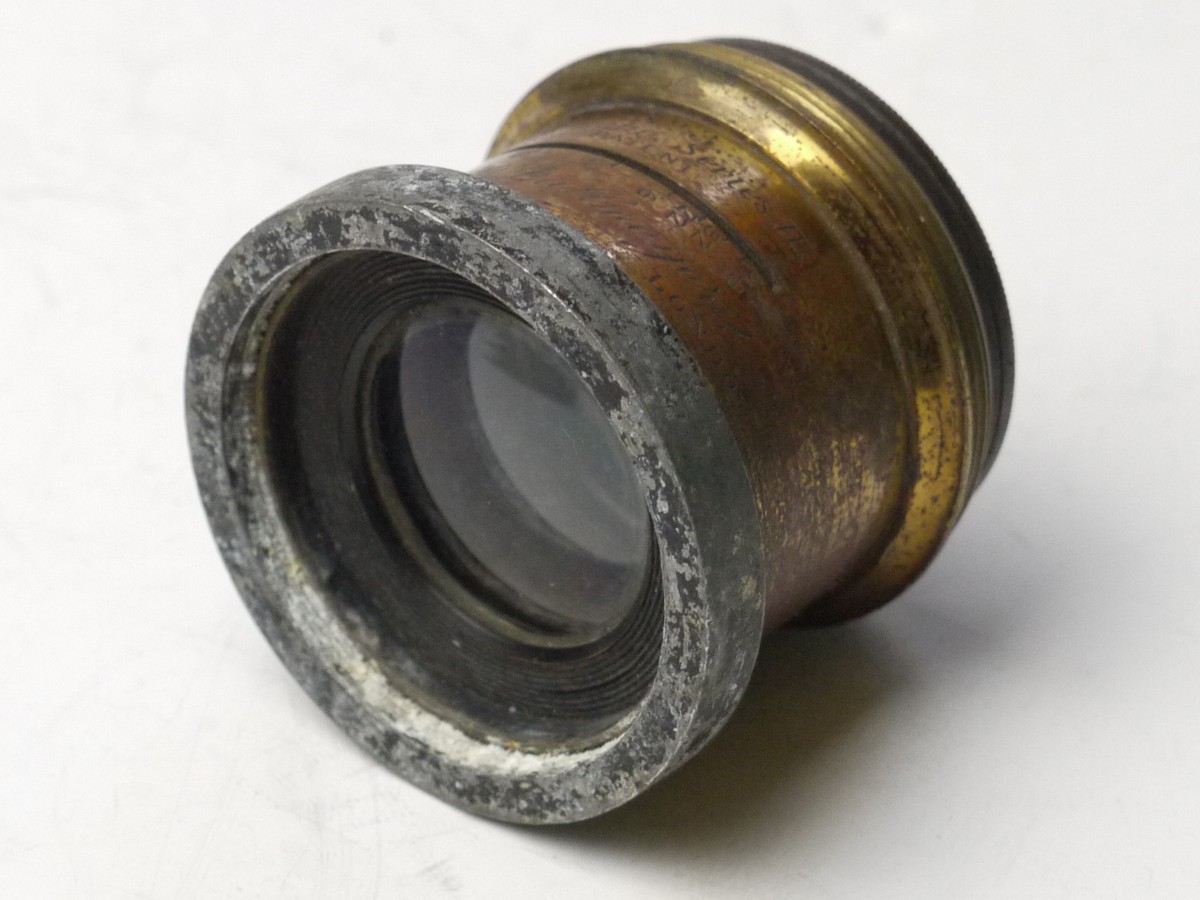 mwclassiccameras-20250321-128 Dallmeyer 7 inch (Estimated) f6 No.3 Stigmatic Series II brass lens. Has slot & internal parts previously used for an Iris Diaphragm