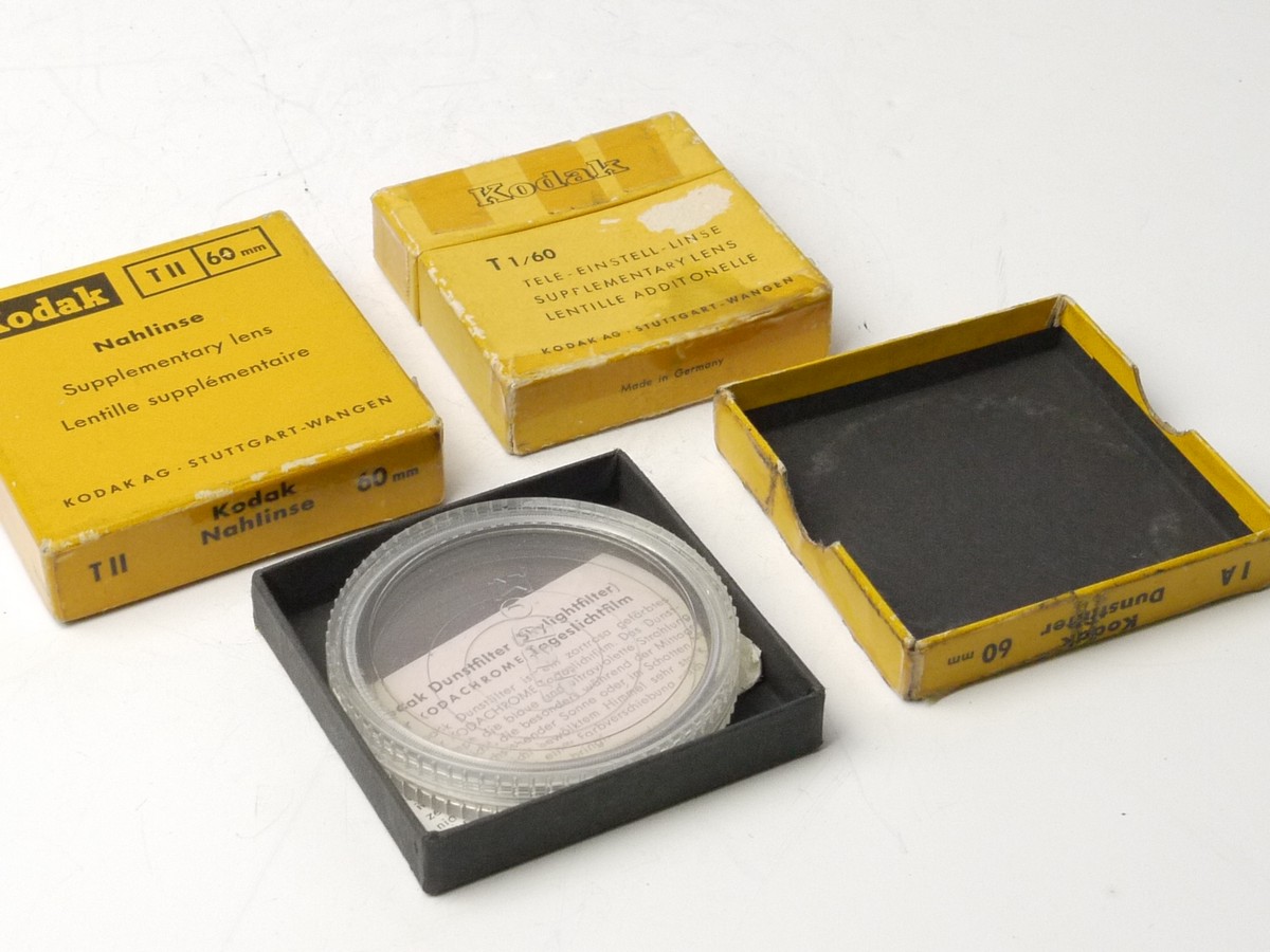 mwclassiccameras-20250321-205 Kodak 60mm Screw-in filter set. Skylight 1A + T1 & T2 Supplementary lenses. All in Keeper cases & Boxes