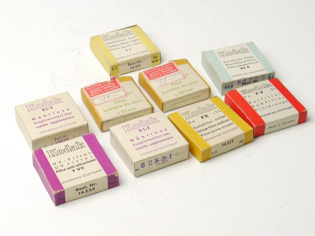 mwclassiccameras-20250321-213 Kodak Set of Nine 32mm Screw-in filters, all with keeper cases & Boxes - UV, Light Yellow, Medium Yellow, Red, R1:2 & R1:3 Close-Ups & Three Colour Correction filters