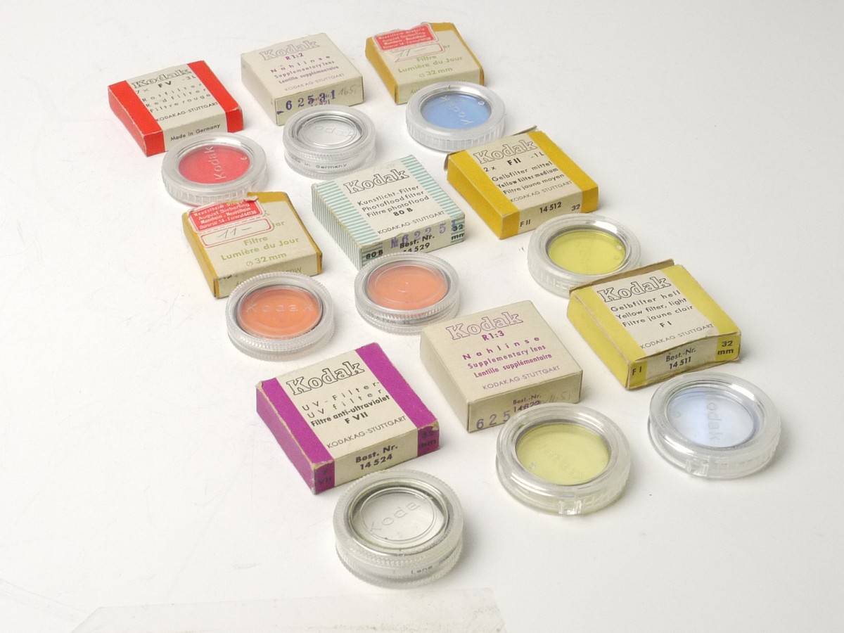 mwclassiccameras-20250321-214 Kodak Set of Nine 32mm Screw-in filters, all with keeper cases & Boxes - UV, Light Yellow, Medium Yellow, Red, R1:2 & R1:3 Close-Ups & Three Colour Correction filters