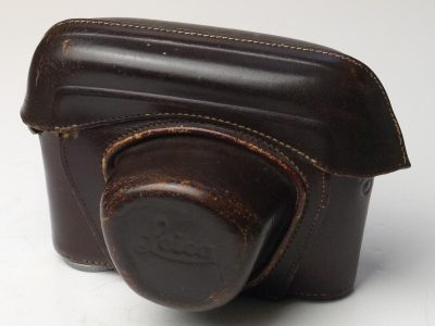 Leitz brown leather ER case for the M2/M3, with strtap. Has long nose front, single fastener at the back, small tripod bush