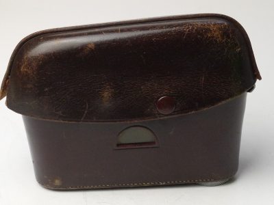 Leitz brown leather ER case for the M2/M3, with strtap. Has long nose front, single fastener at the back, small tripod bush